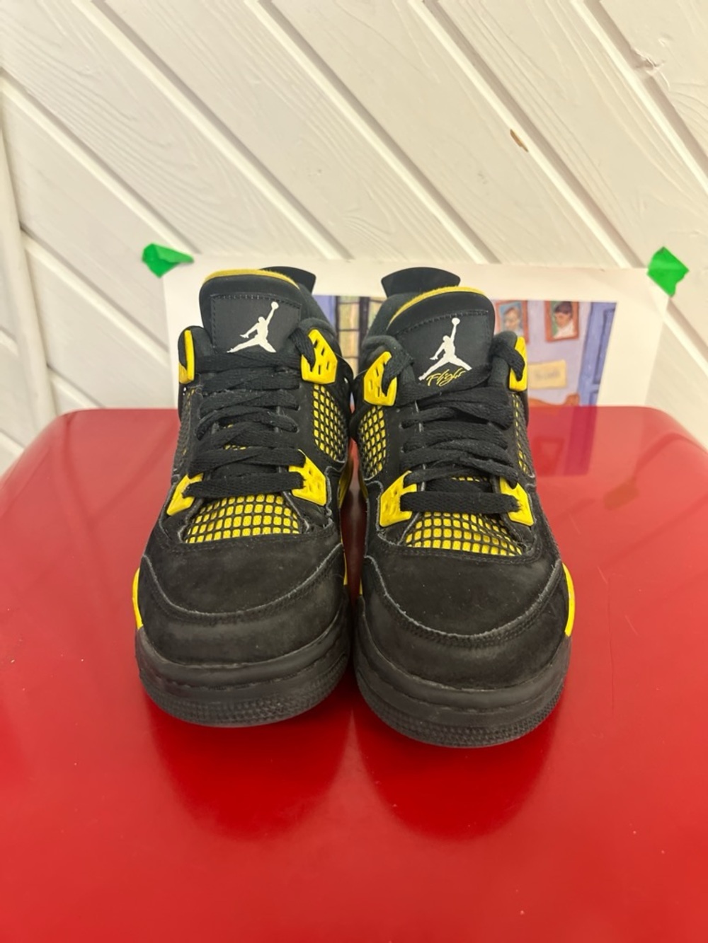 Air Jordan 4 Black And Yellow Sneakers